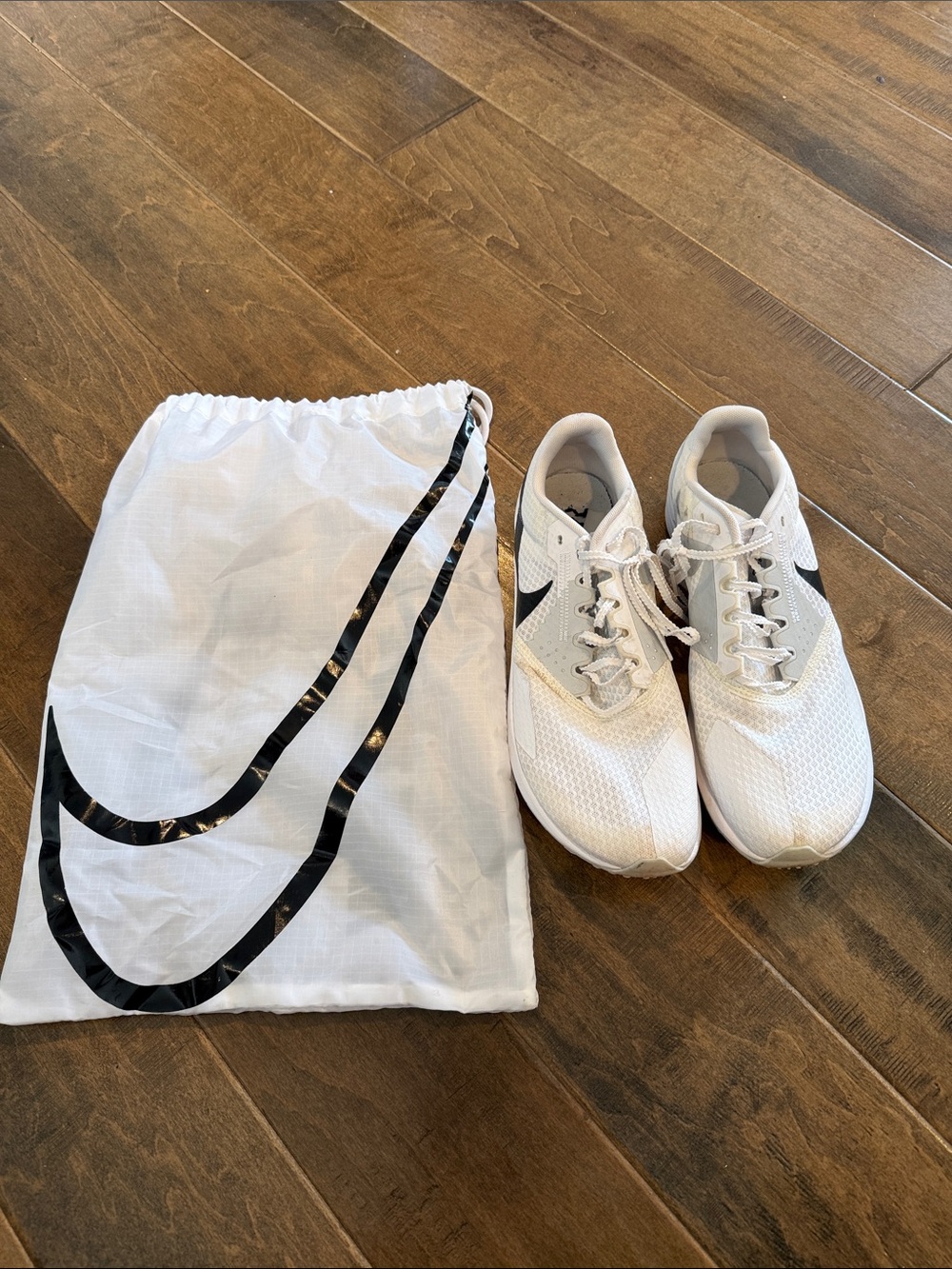 Nike White and Black Athletic Sneakers with Branded Drawstring Bag